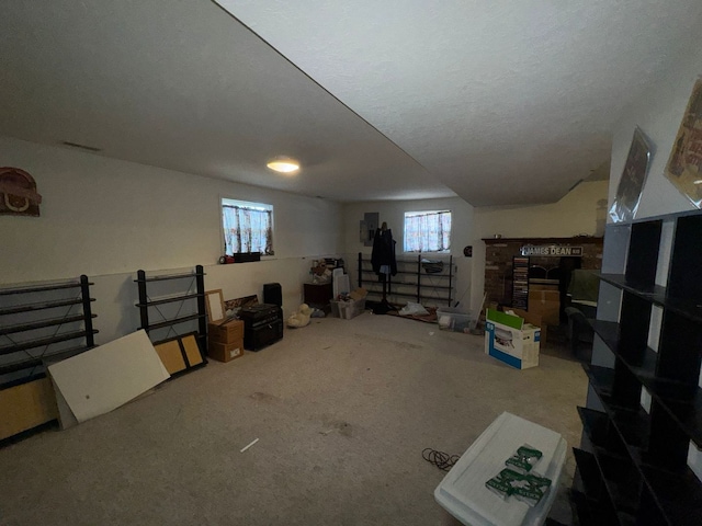 basement featuring a textured ceiling