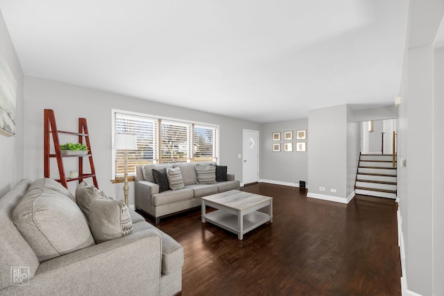 living room with dark hardwood / wood-style flooring