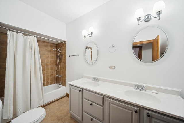 full bathroom with vanity, toilet, shower / bath combo, and tile patterned flooring