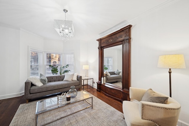 living room featuring a wealth of natural light, dark hardwood / wood-style floors, and ornamental molding