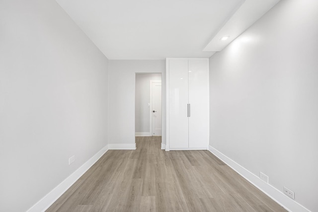 unfurnished room featuring light wood-type flooring