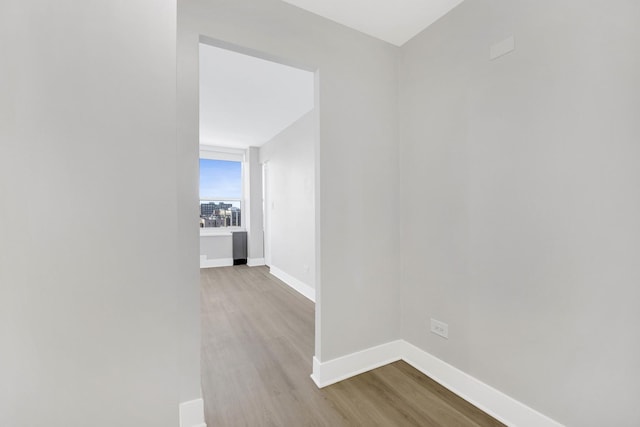 corridor featuring light hardwood / wood-style flooring