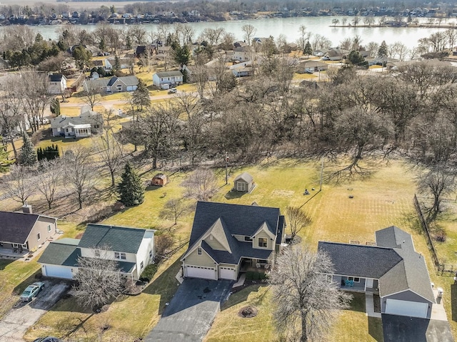 drone / aerial view featuring a water view