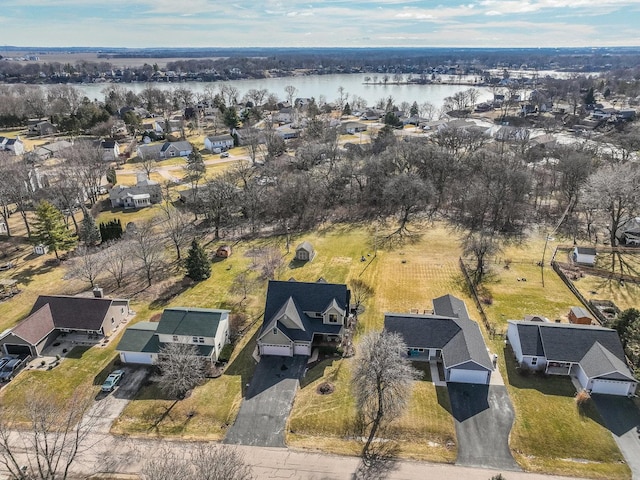 bird's eye view with a water view