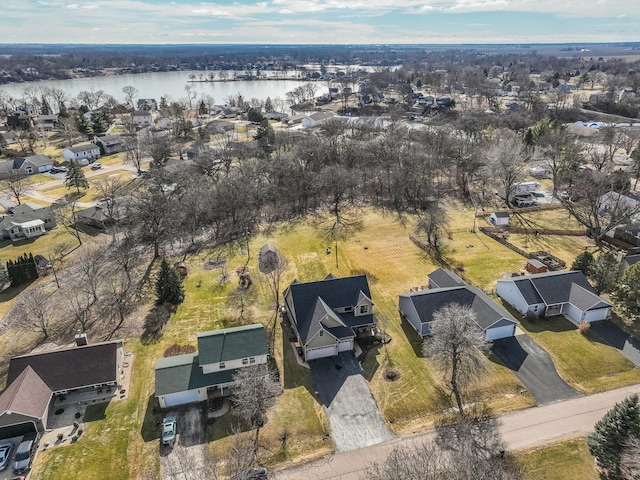 aerial view featuring a water view and a residential view