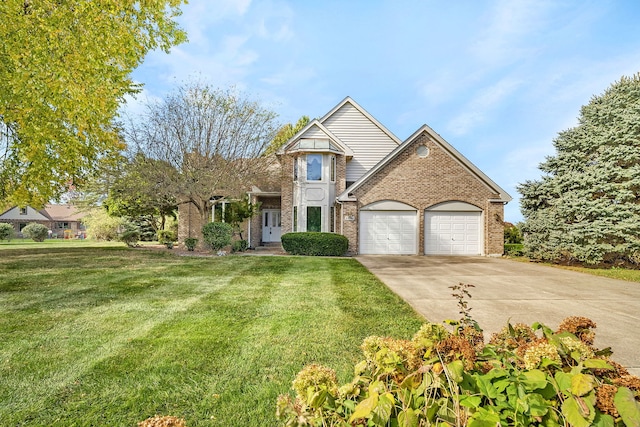 view of front of property with a garage and a front yard