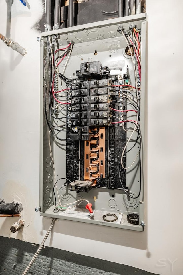 utility room featuring electric panel