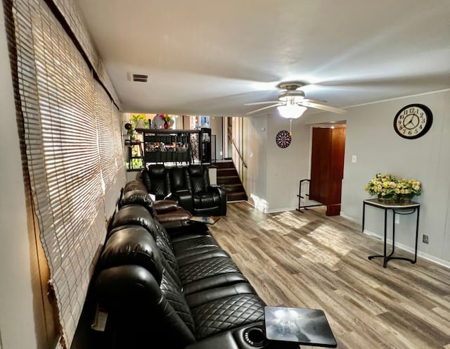 living room with light hardwood / wood-style flooring