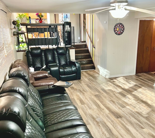 living room with hardwood / wood-style flooring and crown molding