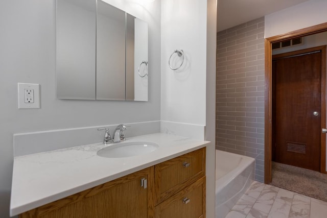 bathroom with vanity and tub / shower combination