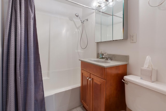 full bathroom featuring tile patterned flooring, shower / bath combo with shower curtain, vanity, and toilet