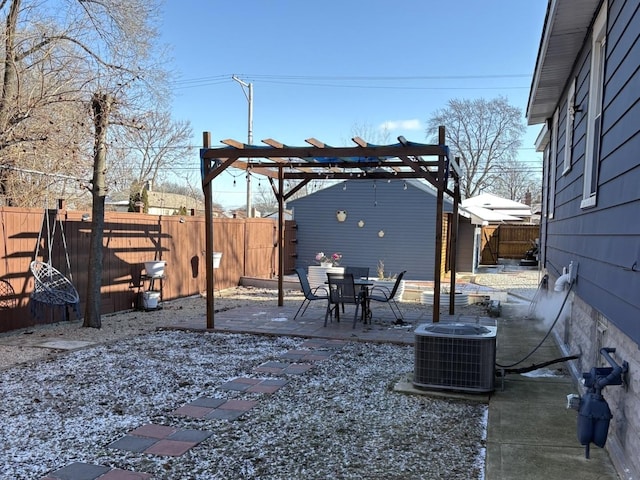 exterior space with central air condition unit and a pergola