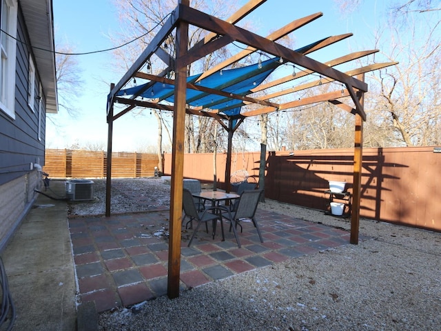 view of patio with cooling unit and a pergola