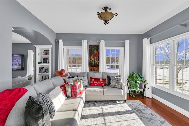 living room featuring hardwood / wood-style flooring and plenty of natural light