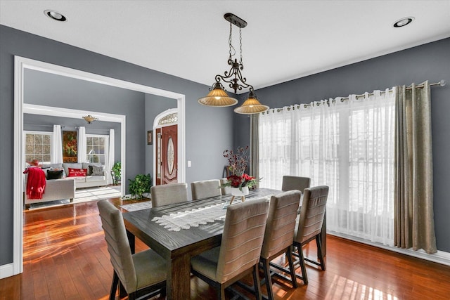 dining space featuring hardwood / wood-style flooring