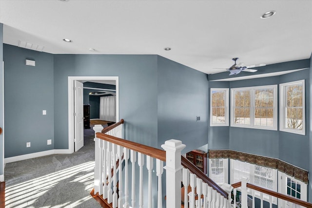 hallway featuring carpet floors