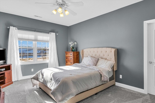 bedroom featuring ceiling fan and carpet flooring