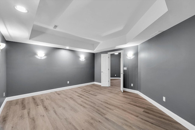 basement featuring light hardwood / wood-style floors