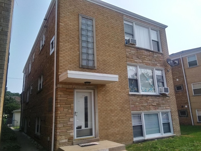 view of front of house with cooling unit