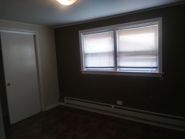 empty room with a baseboard radiator