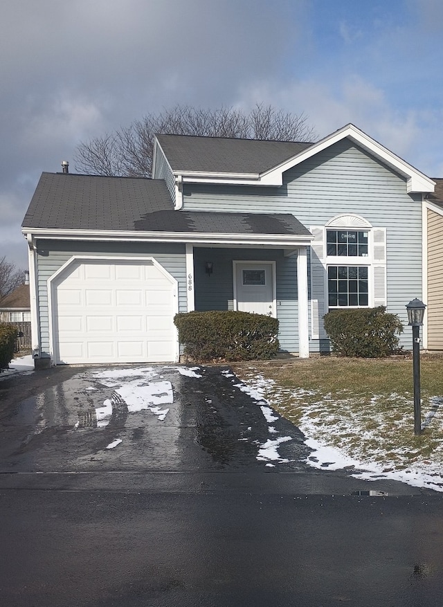 view of front of property featuring a garage