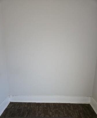 empty room with baseboards