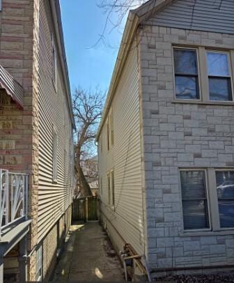 view of property exterior featuring stone siding