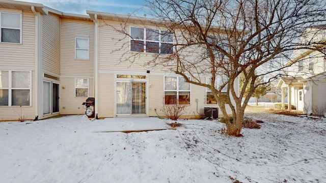 view of snow covered house