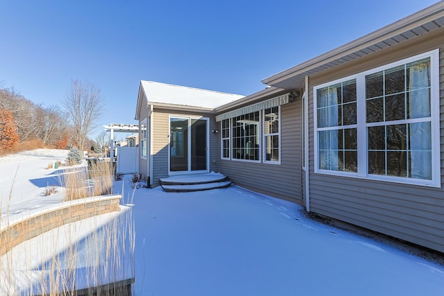 view of snow covered patio