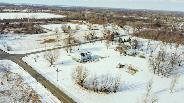 snowy aerial view with a rural view