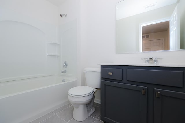 full bathroom featuring tile patterned flooring, vanity, toilet, and washtub / shower combination