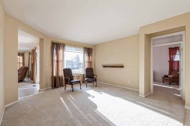 unfurnished room with light colored carpet