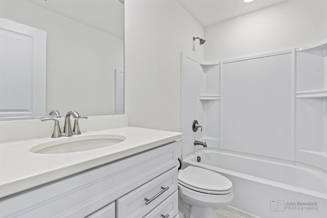 full bathroom featuring vanity, toilet, and shower / washtub combination