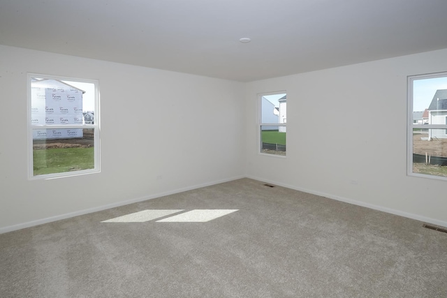 view of carpeted spare room