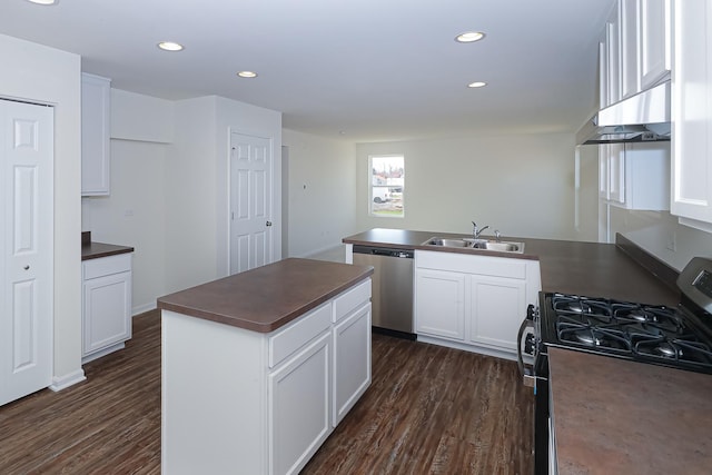 kitchen featuring dishwasher, sink, white cabinetry, and black range with gas cooktop