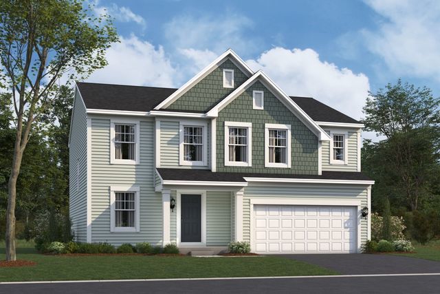 view of front facade featuring a front yard and a garage