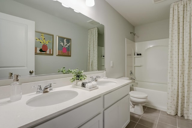 full bathroom featuring tile patterned flooring, vanity, toilet, and shower / bath combo with shower curtain