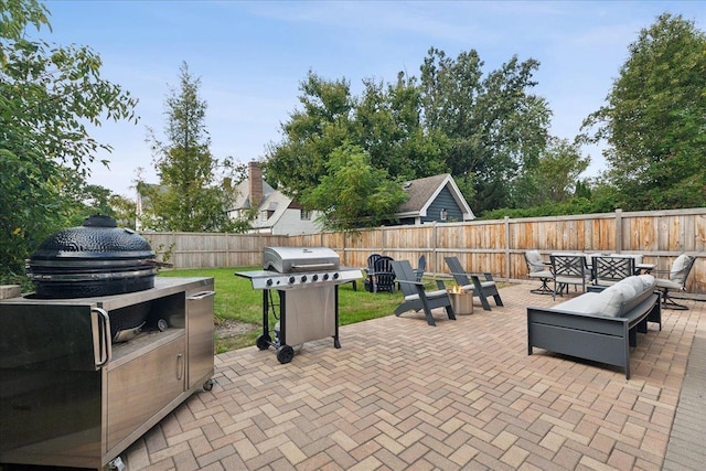 view of patio with a grill