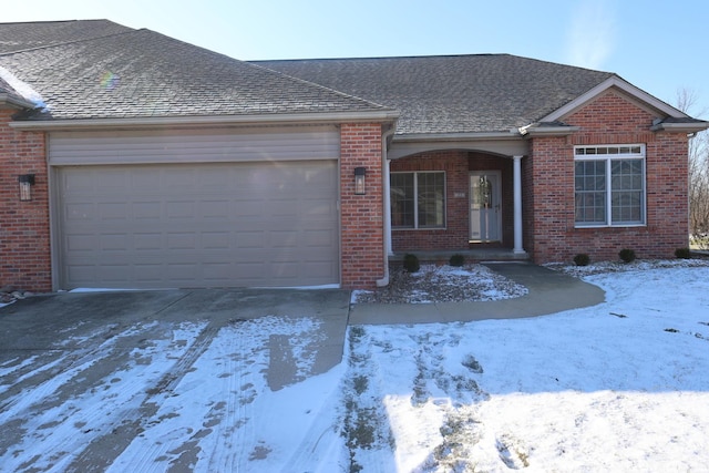 ranch-style home with a garage