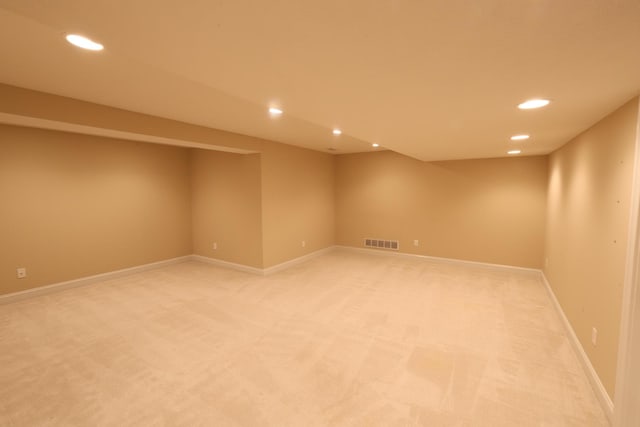 empty room with carpet flooring