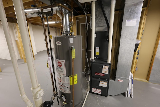 utility room with heating unit and gas water heater