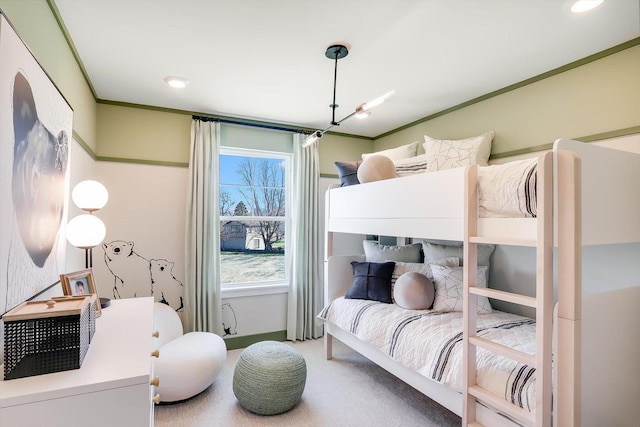 bedroom featuring carpet flooring and ornamental molding