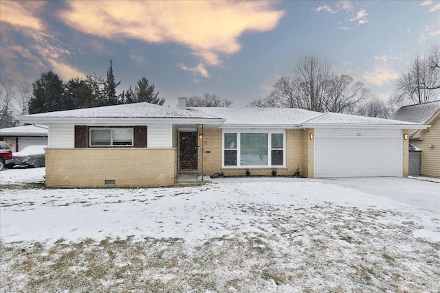 single story home featuring a garage