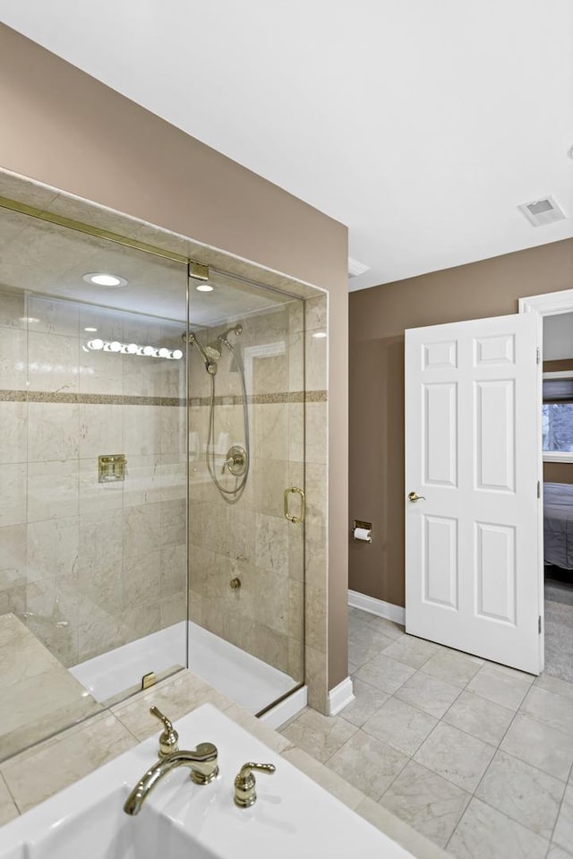 bathroom featuring plus walk in shower