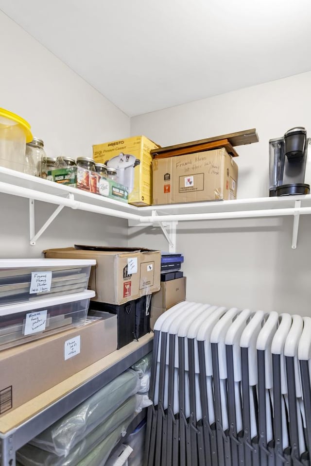 storage area featuring radiator heating unit