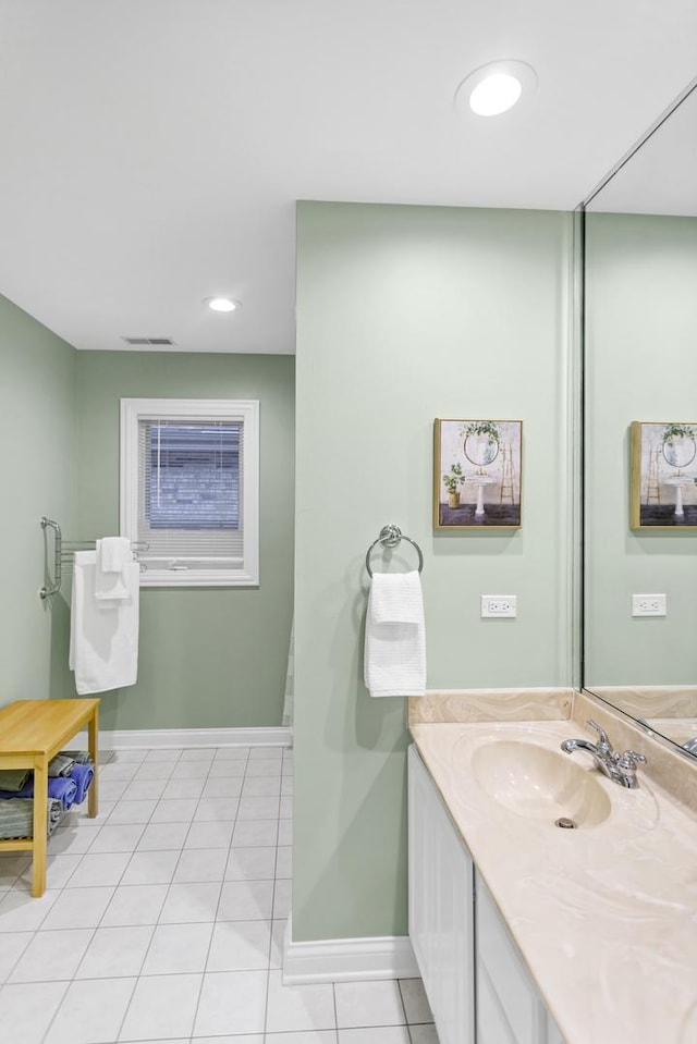 bathroom featuring vanity and tile patterned flooring