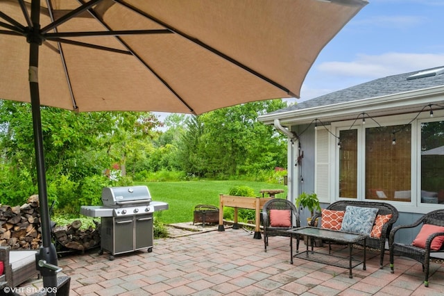 view of patio with a grill