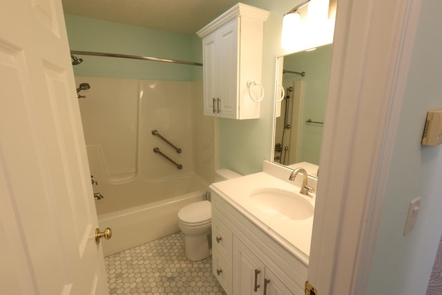 full bathroom featuring shower / bathing tub combination, vanity, and toilet