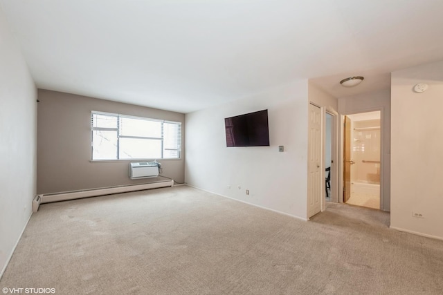 empty room featuring an AC wall unit, baseboard heating, and light carpet