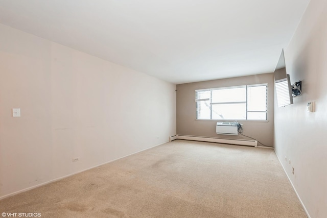 empty room with light colored carpet and a baseboard heating unit